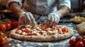 Food concept. Preparing traditional italian pizza. Young smiling chef in uniform Royalty Free Stock Photo