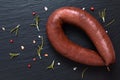 Food concept Raw Blood pudding black sausages on black slate stone