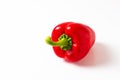 Food concept Single organic red bell pepper or paprika isolated on white background Royalty Free Stock Photo