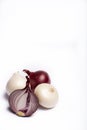 Food concept on white background, group of white and red onions Royalty Free Stock Photo