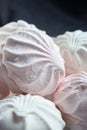 food, confection and sweets concept - close up of zephyr or marshmallow dessert on plate Royalty Free Stock Photo