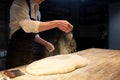 Chef or baker making bread dough at bakery Royalty Free Stock Photo