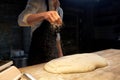 Chef or baker making bread dough at bakery Royalty Free Stock Photo