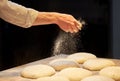 Chef or baker making bread dough at bakery Royalty Free Stock Photo