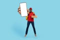 Food Delivery App. Black Courier Guy With Pizza Boxes Showing Blank Smartphone Royalty Free Stock Photo