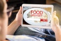 Food delivery app on tablet. Royalty Free Stock Photo