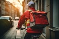 Food delivery courier person rushing bike bicycle cycling city streets red uniform order carrying bag backpack mail