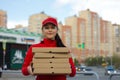 Pizza delivery in a big city. Royalty Free Stock Photo