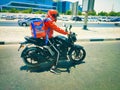 Food delivery guy on his way to customer Royalty Free Stock Photo