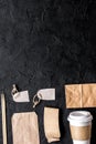 Food delivery with paper bags and plastic cup on dark table background top view mockup Royalty Free Stock Photo