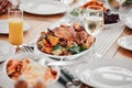 Food, dinner and party with drinks and table setting, celebration and holiday with Christmas or thanksgiving. Social Royalty Free Stock Photo