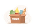 Food donation. Cardboard box full of different products. Volunteering and social care concept. Support for poor people Royalty Free Stock Photo