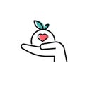 Food donation icon on white. Hand holding apple for donations. Vector black icon for volunteering, support for poor people,