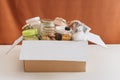 Food donations box isolated on table Royalty Free Stock Photo