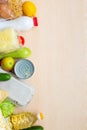 Food donations on wood table. top view