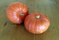 Autumn vegetables, two whole Hokkaido pumpkins.