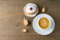 Food and drink concept. Coffee cup with traditional donuts sufganiyah for Hanukkah on wooden table