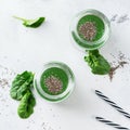 Healthy green vegan smoothie with spinach, spirulina and chia seeds Royalty Free Stock Photo