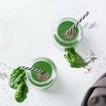 Healthy green vegan smoothie with spinach, spirulina and chia seeds Royalty Free Stock Photo