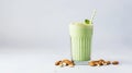 Food and drink, healthy lifestyle, diet and nutrition concept. Green smoothie with organic almond nuts. Top view flat Royalty Free Stock Photo