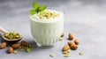 Food and drink, healthy lifestyle, diet and nutrition concept. Green smoothie with organic almond nuts. Top view flat Royalty Free Stock Photo