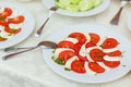 Food and drink at the restaurant. Table setting. Tasting dishes. Set of cold snacks, canape, beverages, closeup  parte meals Royalty Free Stock Photo