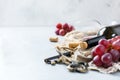 Bottle, corkscrew, glass of red wine, grapes on a table Royalty Free Stock Photo