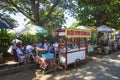 Food and drink vendors outside a Balinese temple in Bali, Indonesia.