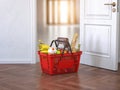 Food and eats delivery concept. Shopping basket with grocery in front of open door