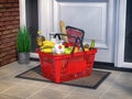 Food and eats online buying and delivery concept. Shopping basket with grocery in front of door