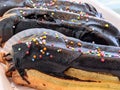 food eclairs on display