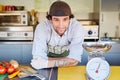 Food entrepeneur with some freshly minced red meat in his kitche Royalty Free Stock Photo