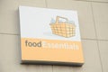 tor, canada - august 9, 2023: food essentials writing caption text square sign mounted to wall with picture. p