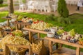 Food at the event, wedding reception with a variety of cheese, fruits, nuts and breads laid out on wooden stands Royalty Free Stock Photo