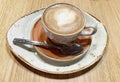 Hot cup of coffee cappuccino close up Royalty Free Stock Photo