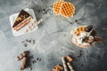 Food frame of chocolate milkshake with dripping sauce, cream, cake and cookie Royalty Free Stock Photo