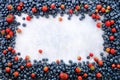 Food frame with mix of strawberry, blueberry. Top view. Vegan and vegetarian concept. Summer berries background Royalty Free Stock Photo