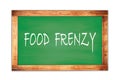 FOOD FRENZY text written on green school board