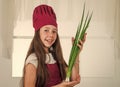 Food fresh from the farm. small girl baking in kitchen. kid chef cooking with onion. child prepare healthy food at home Royalty Free Stock Photo