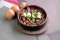 Eggplant slices are rolled into rolls with Suluguni cheese and baked with vegetables in tomato sauce Royalty Free Stock Photo