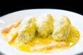 Greek cuisine: Stuffed zuchinni with avgolemono