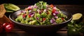 Food Guacamole salad with tomatoes, onions, and limes on a plantbased table