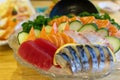 Sashimi mixed fishes such as salmon tuna octopus and crab stick japanese food in restaurant.