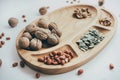 Food, healthy eating and nutrition concept - sliced pumpkin and other vegetables on wooden board. Fresh vegetables and greens on a