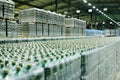 Food industrial warehouse for storage and storage of tetrapacks with drinks, water, beer in plastic bottles. Royalty Free Stock Photo