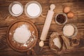 Food ingredients for dough a wooden kitchen board. Cake recipies