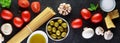 Food ingredients for italian pasta, spaghetti on black stone slate background. Banner Royalty Free Stock Photo