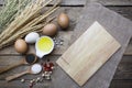 Food ingredients, kitchen utensils for cooking on wooden backgr Royalty Free Stock Photo