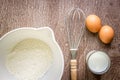 Food ingredients and kitchen utensils for cooking on wooden background Royalty Free Stock Photo