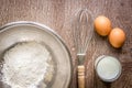 Food ingredients and kitchen utensils for cooking on wooden background Royalty Free Stock Photo